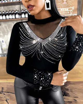 Blouse cloutée à manches longues